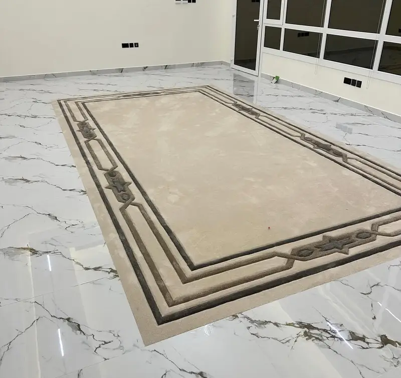 تفصيل سجاد ديوانية حفر يدوي بيج بإطار عربي بنجوم في الأحمدي